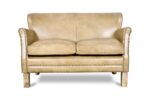 Divano due posti in pelle crema